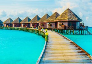 Beautiful tropical Maldives resort hotel and island with beach and sea on sky for holiday vacation background concept -Boost up color Processing